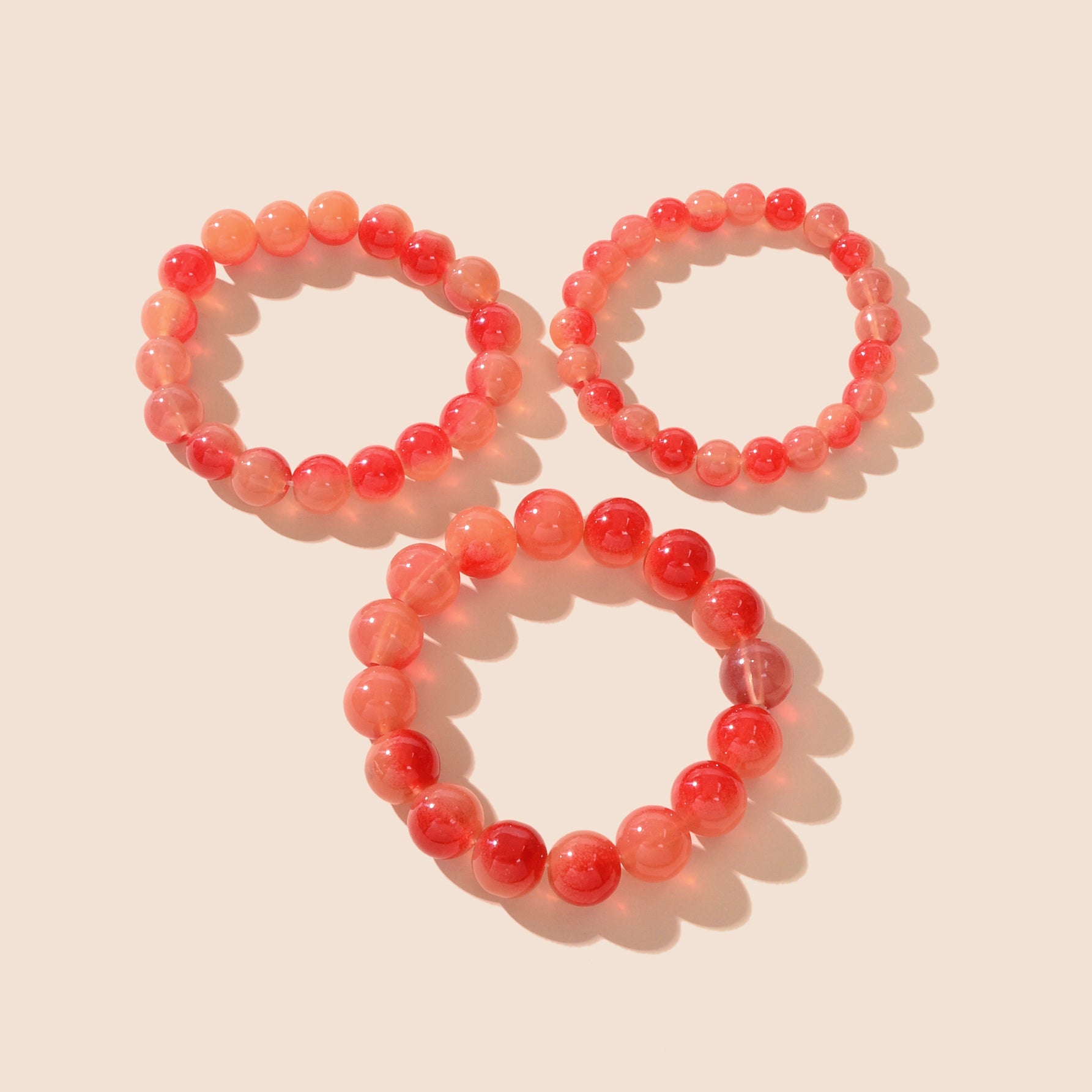 Set di 3 bracciali con perle decorative