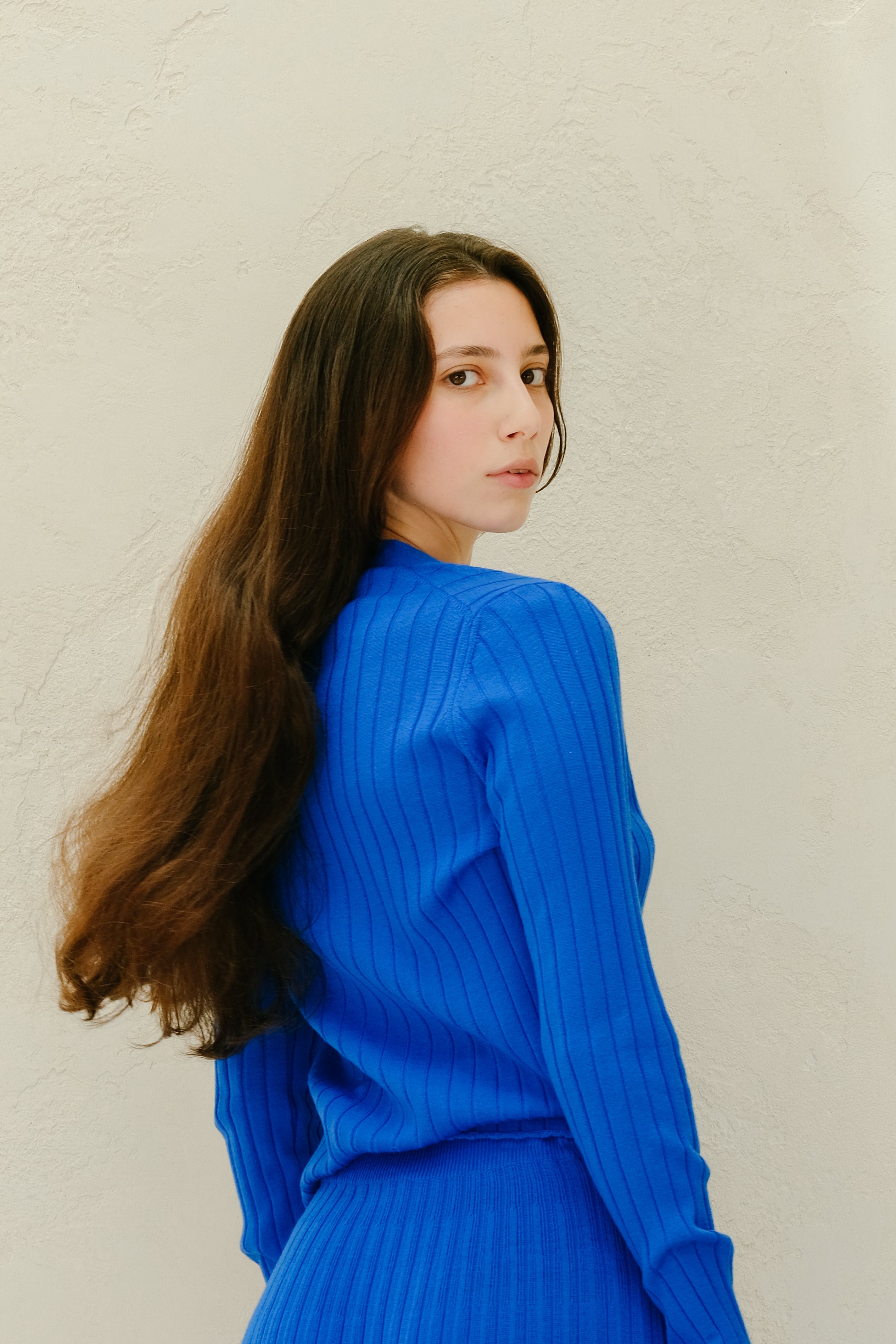 Cardigan in lana merino extrafine con scollo a V
