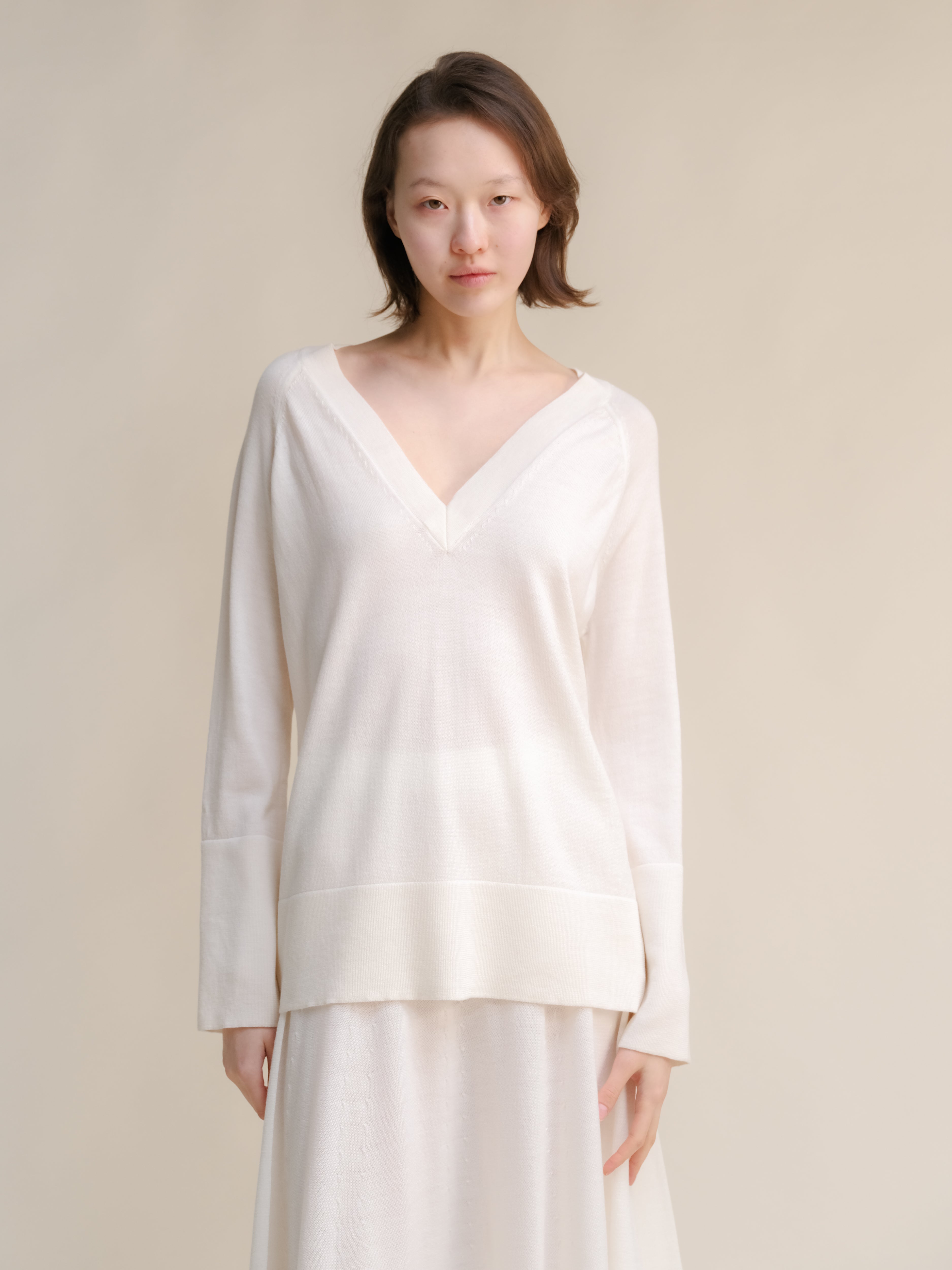 Maglione maxi con scollo a V in lana merino extrafine