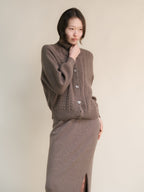 Cardigan polo in misto cashmere con lavorazione treccia