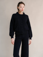 Cardigan polo in misto cashmere con lavorazione treccia