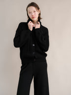 Cardigan polo in misto cashmere con lavorazione treccia