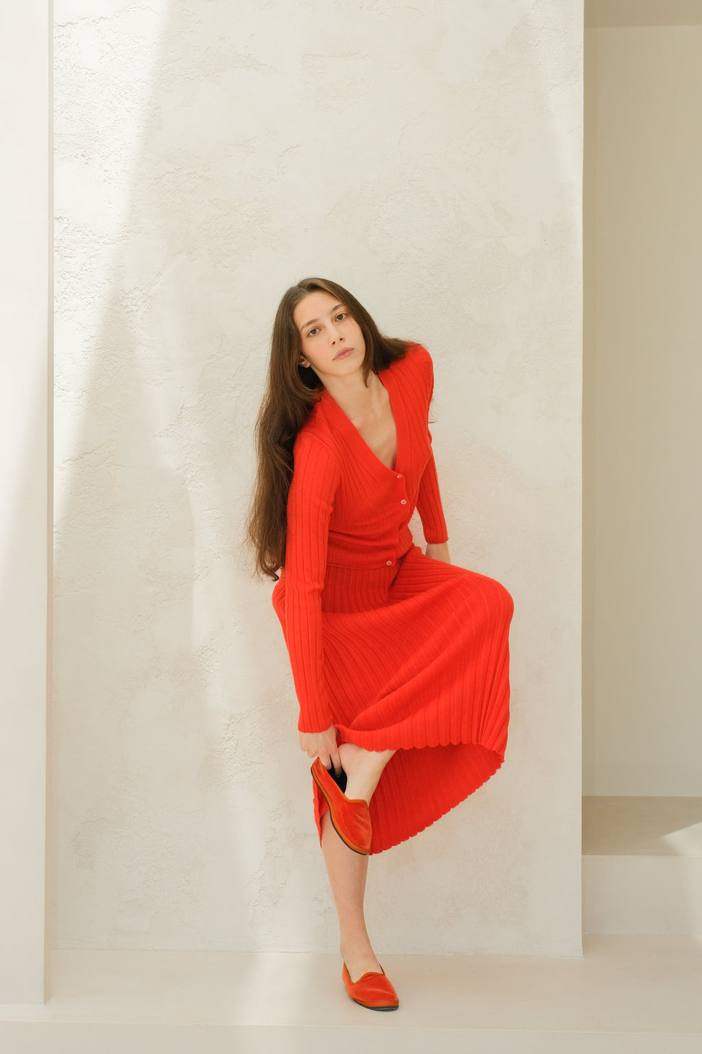 Cardigan in lana merino extrafine con scollo a V