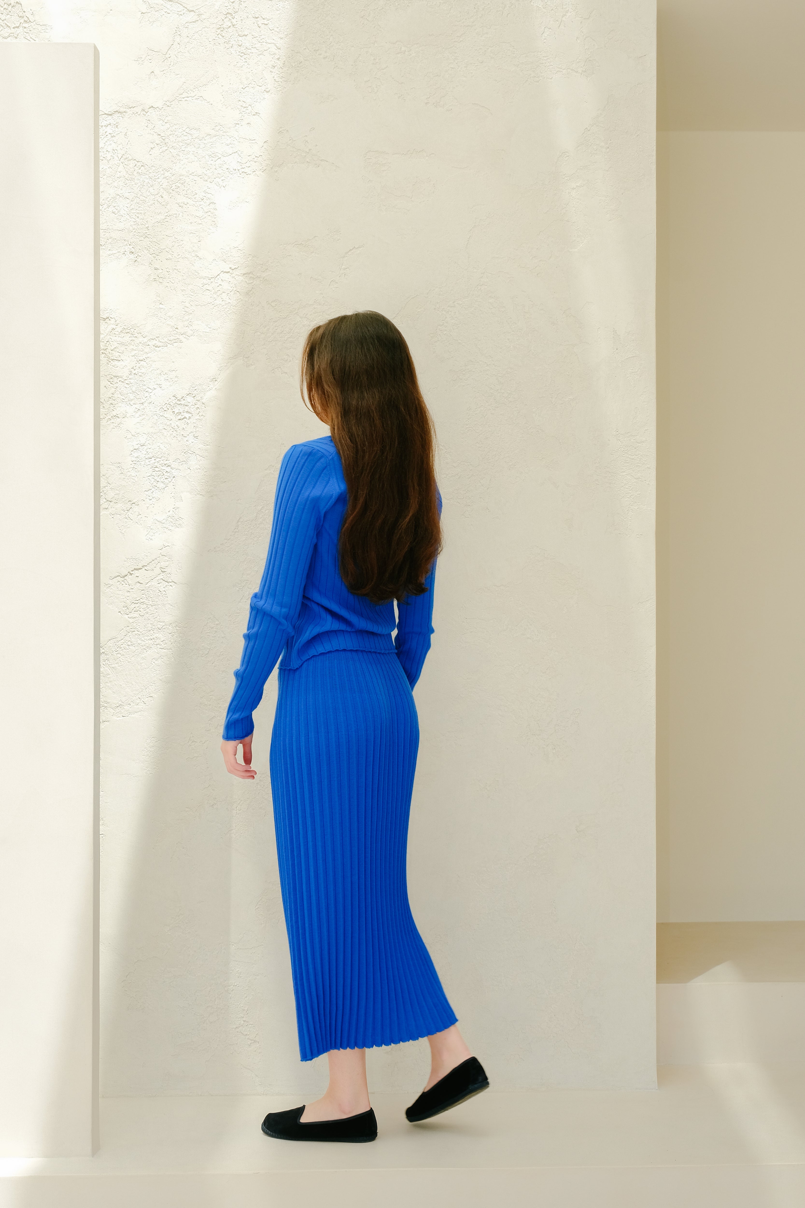 Cardigan in lana merino extrafine con scollo a V
