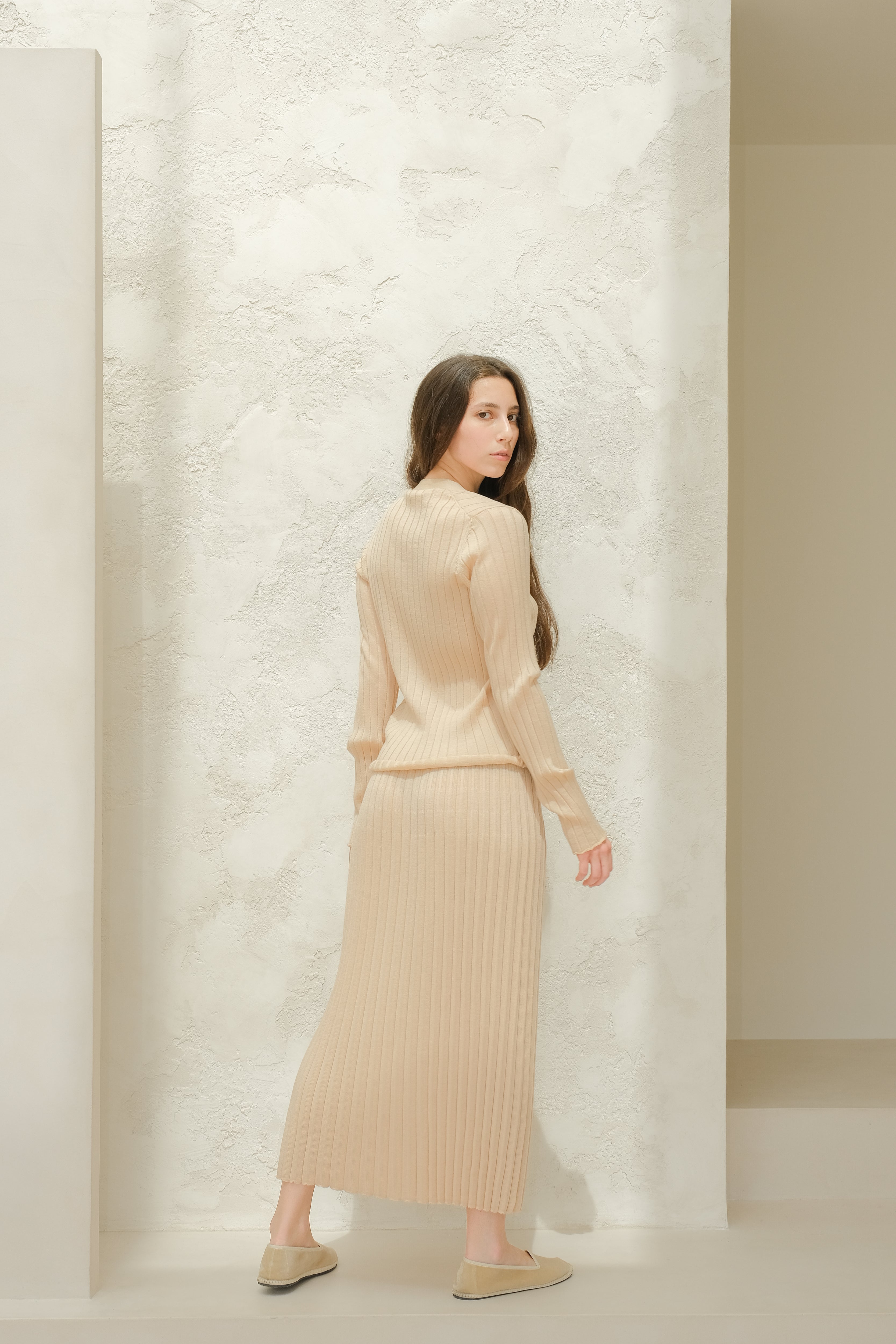 Cardigan in lana merino extrafine con scollo a V