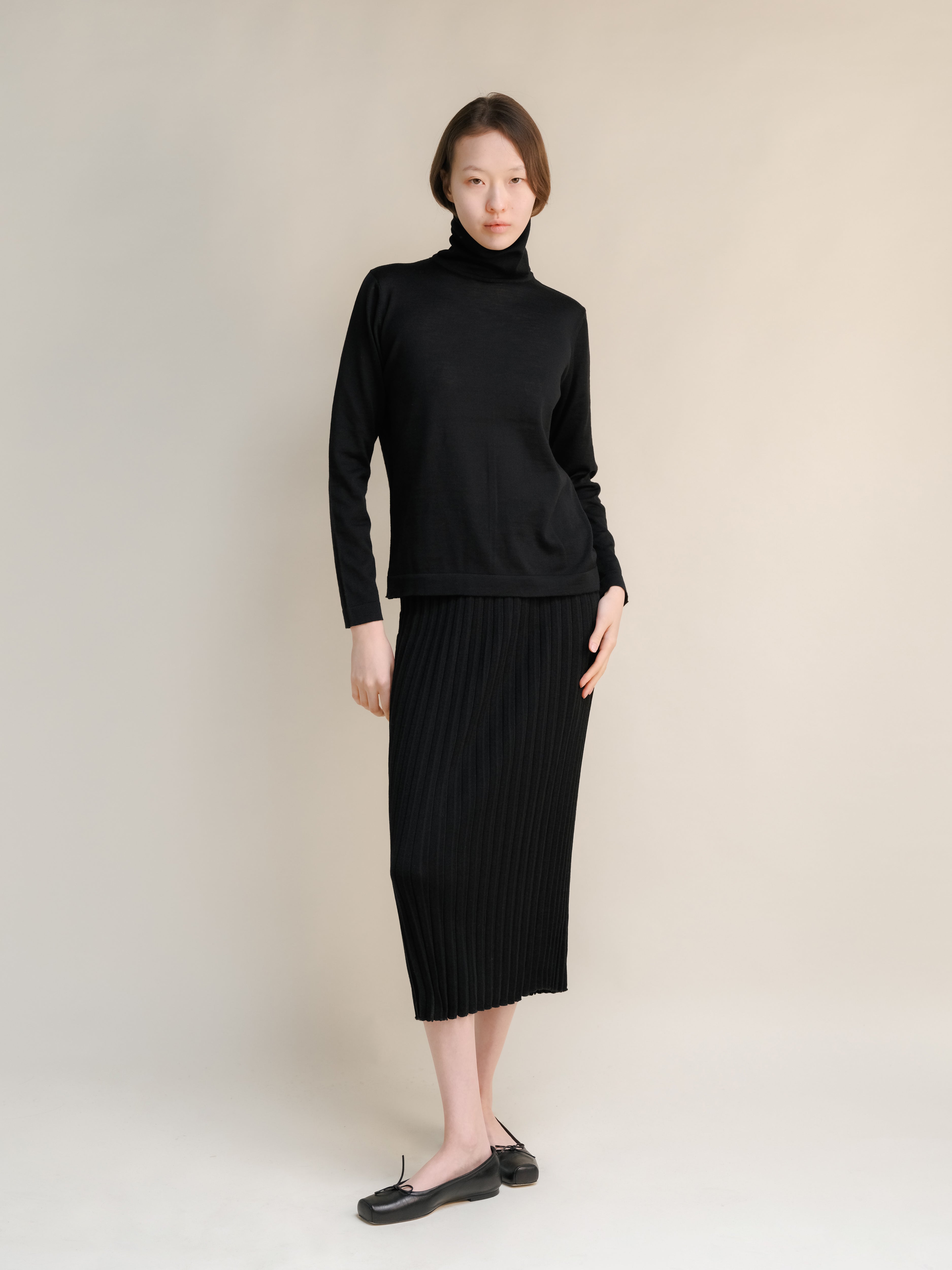 Dolcevita in extrafine lana merino con manica dritta